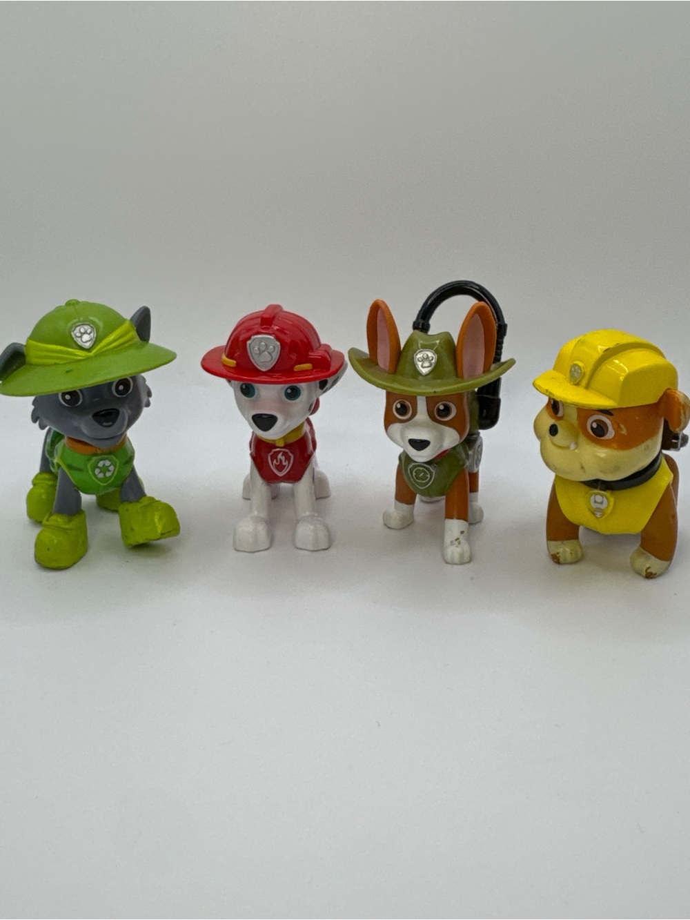 Lot of 4 Paw Patrol Action Figures - Marshall, Tracker, Rocky, Rubble
